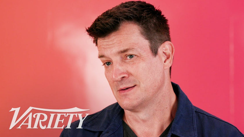 Nathan Fillion dishes about his Green Lantern bowl cut and dropping f-bombs | Comic Con 2025